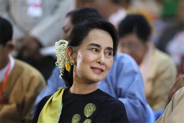 Myanmar's NLD party leader leaves for her first visit to China