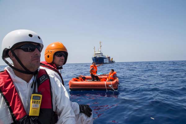 Migrant boat capsizes in Mediterranean, at least 25 dead