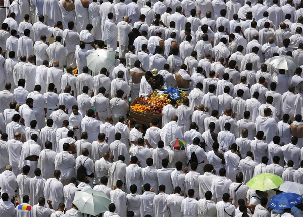 Flags, phones and human chains: Islam's pilgrims seek the way on haj