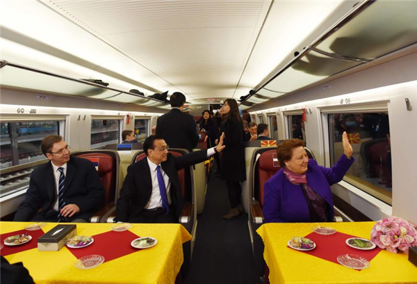 Premier Li and CEE leaders take high-speed train ride