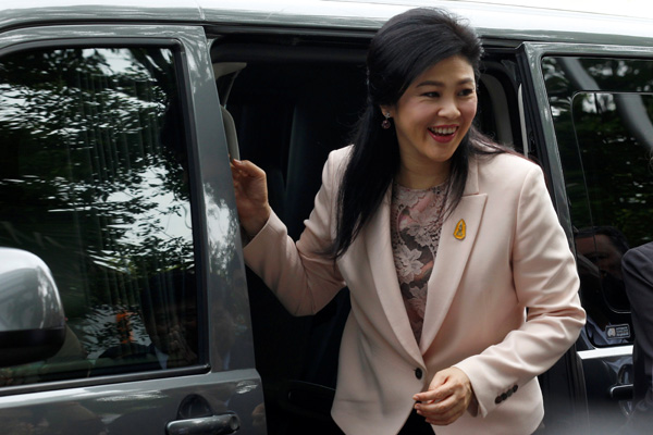 Ousted Yingluck says Thailand's junta must speed up reform