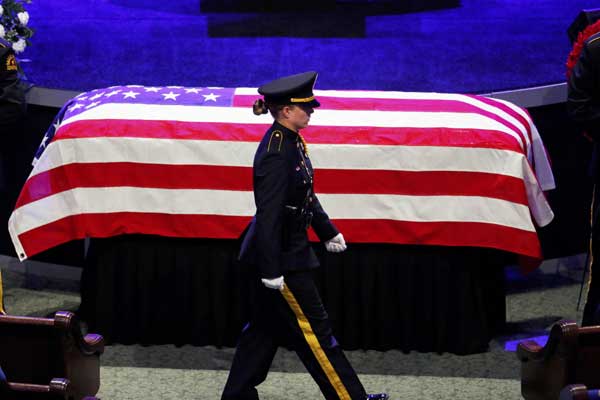 First funerals held for Dallas police slain in racially motivated ambush