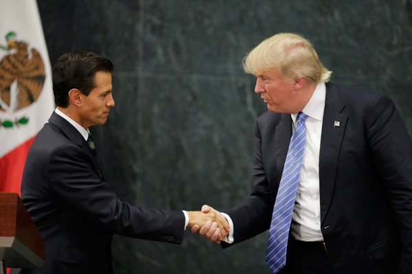 Mexico contradicts Trump on paying for border wall, clouding visit