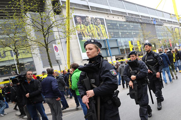 German police arrest suspect over soccer team bus explosions