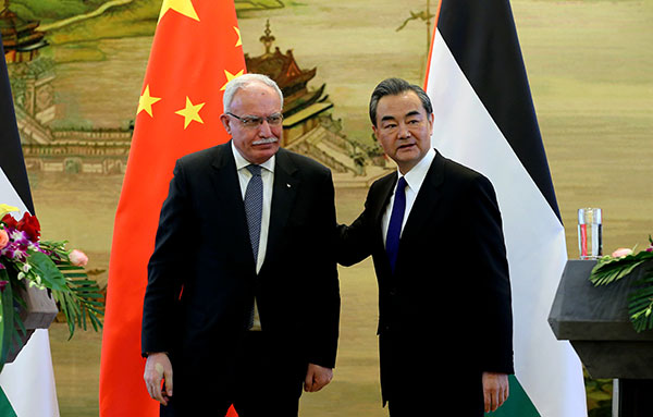 Wang meets Palestine's foreign minister, affirms support for a two-state solution