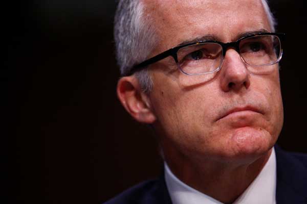 Acting FBI director says will carry on with Russian probe