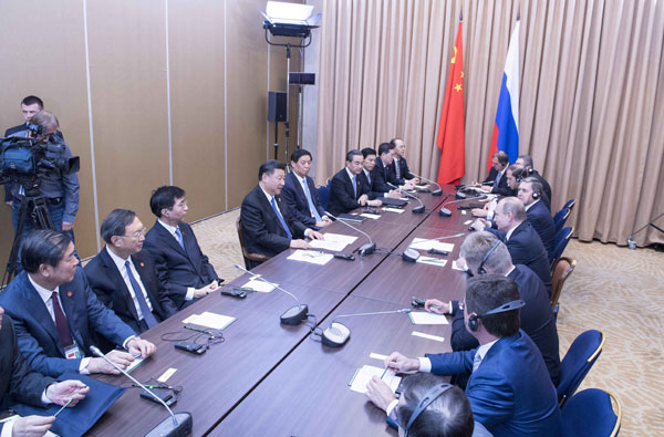 Xi: China, Russia should enhance ties, boost role of SCO