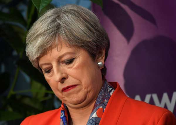 May's future uncertain as Conservatives lose majority