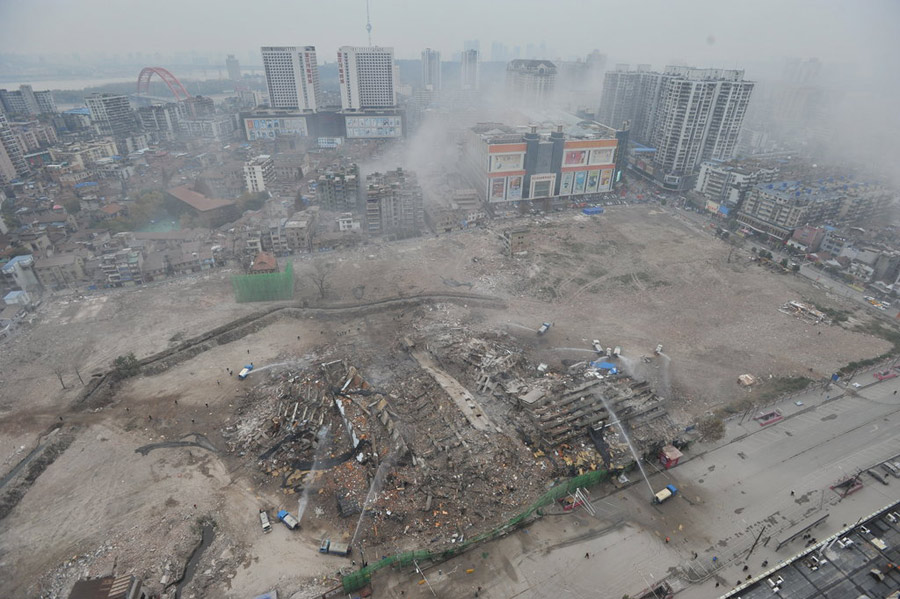 Wuhan brings down building with controlled blasting