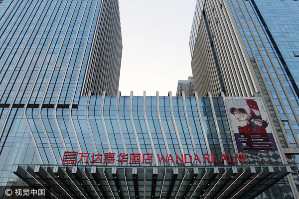 Wanda Hotel shares suspended as overhaul expanded