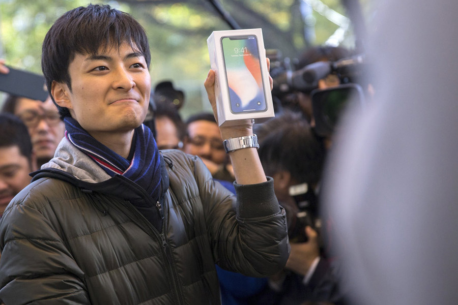 Apple fans around the world line up for iPhone X