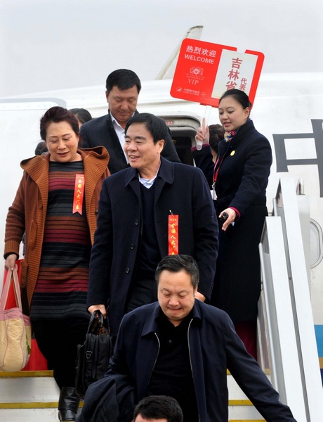 Deputies to 12th NPC arrive in Beijing