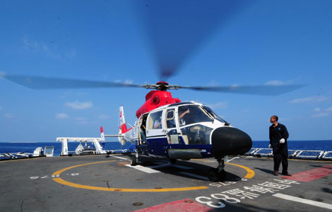 Ships, helicopter patrol Xisha Islands
