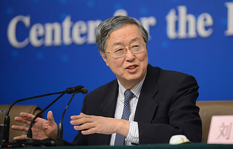 Zhou staying at central bank
