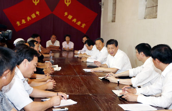 Xi urges CPC members to keep China red