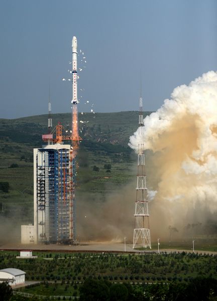 China launches three experimental satellites