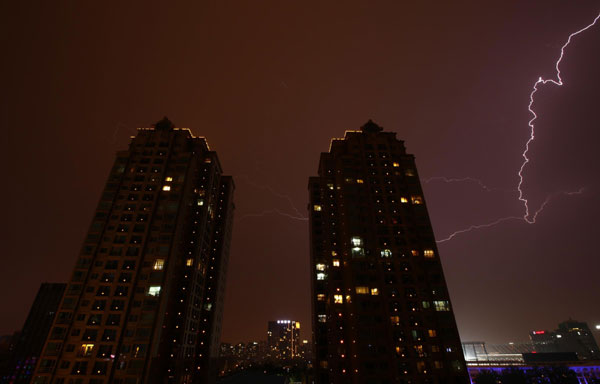 Lightning illuminates the cities