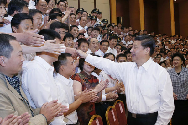 Xi meets outstanding individuals, units in sports work