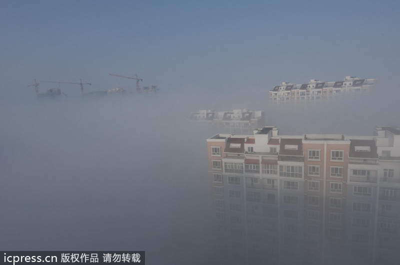 NW China city obscured by fog