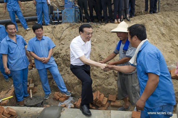 Premier Li stresses urbanization, modern agriculture