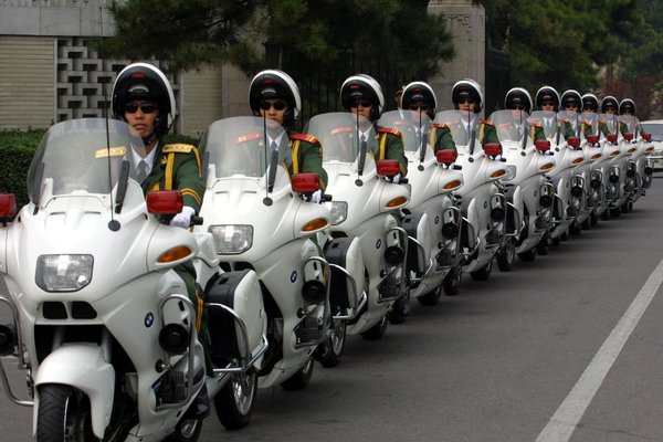 China resumes motorcycle escorts for foreign leaders