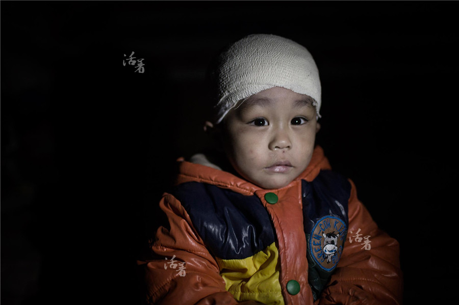 China Daily 2014 photostories: Trials of childhood