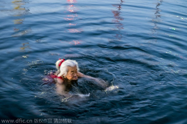 Seniors enjoy swimming despite the chill