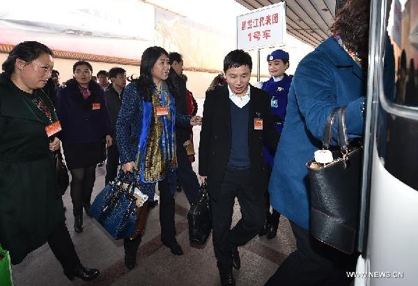 NPC deputies from Heilongjiang arrive in Beijing