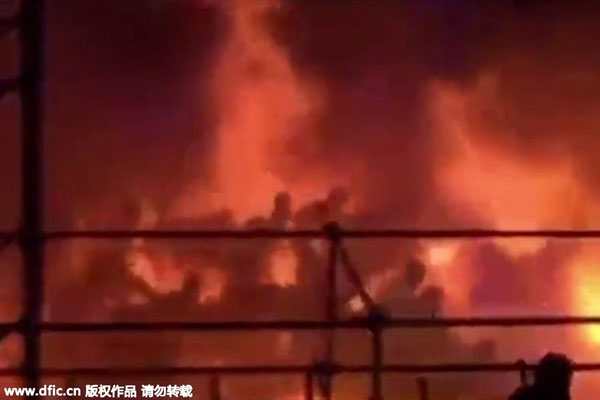 Taiwan investigates blaze; injuries revised down to 498