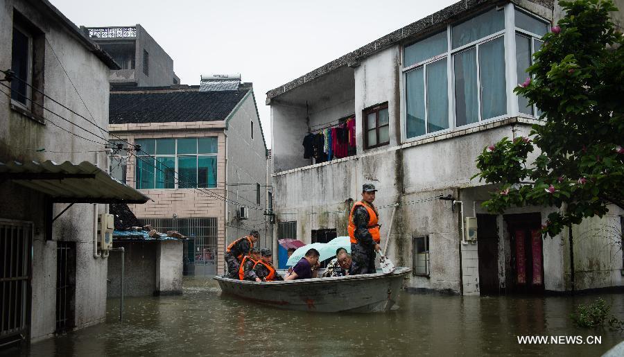 Rainstorms hit East China, flooding streets