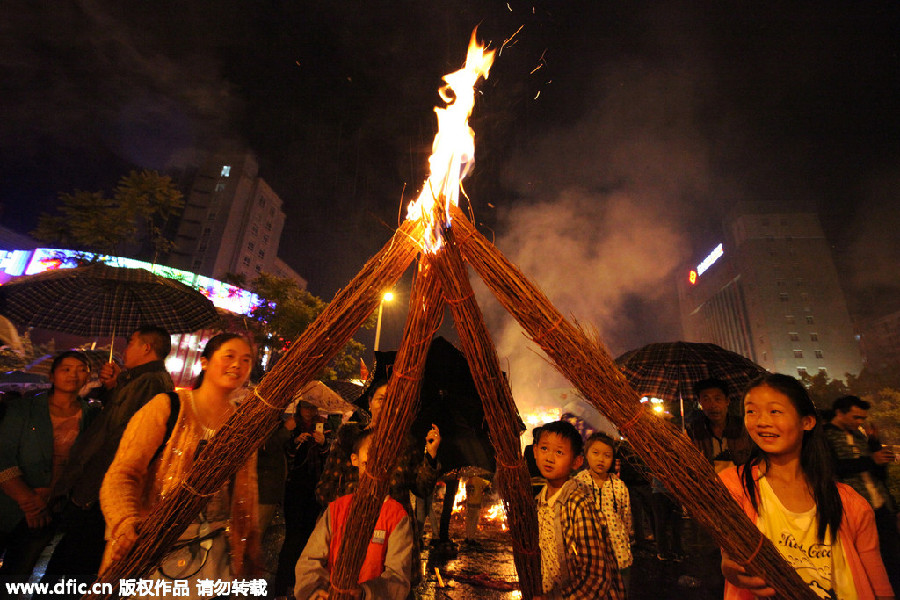 Ethnic groups celebrate the Torch Festival