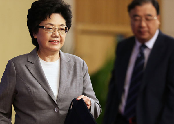 National health minister Li Bin faces the press