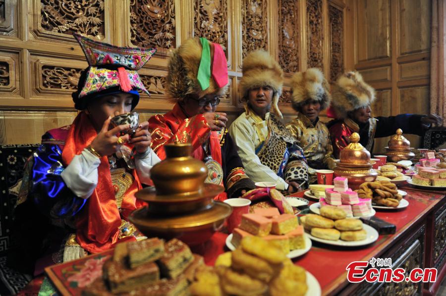 Young couple holds traditional Tibetan wedding ceremony