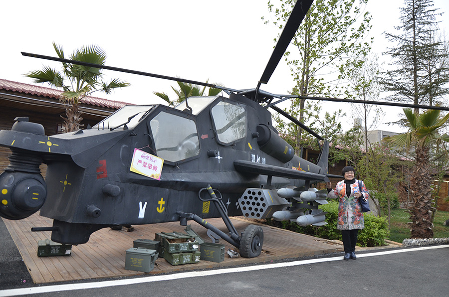 Airplane- enthusiast farmer builds 'military helicopter'