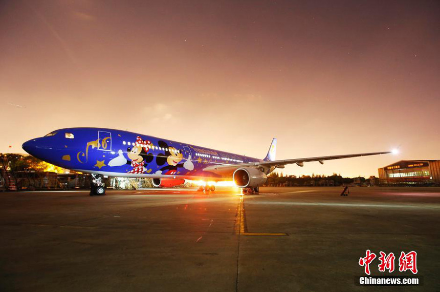 Shanghai unveils Disney-themed plane and station