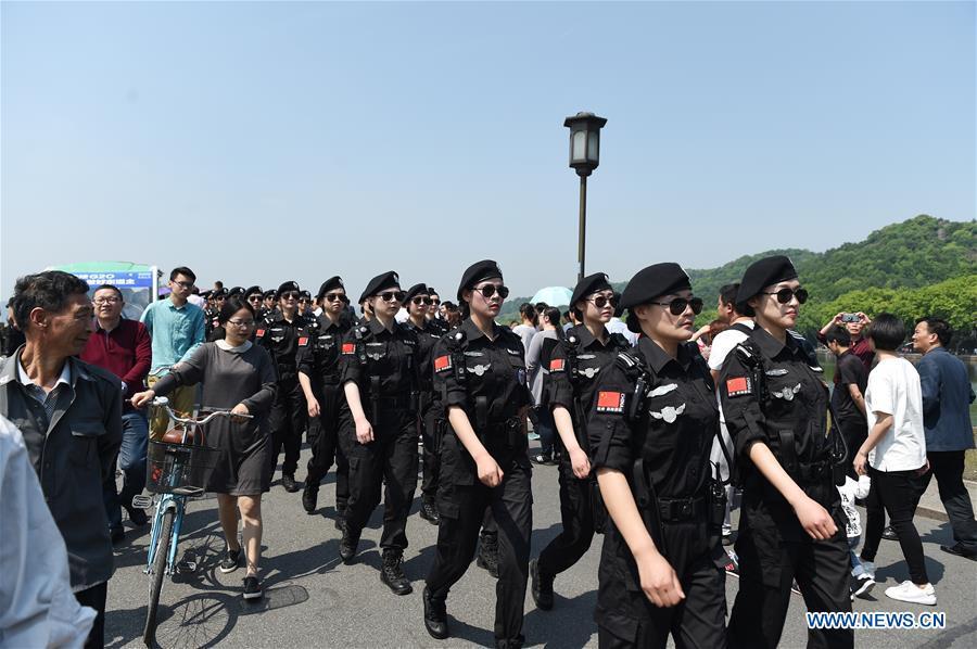Female patrol team seen at West Lake in Hangzhou