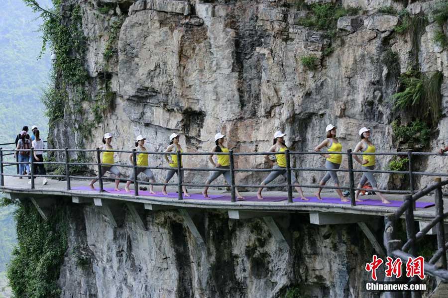 Yoga performance on cliff road in C China