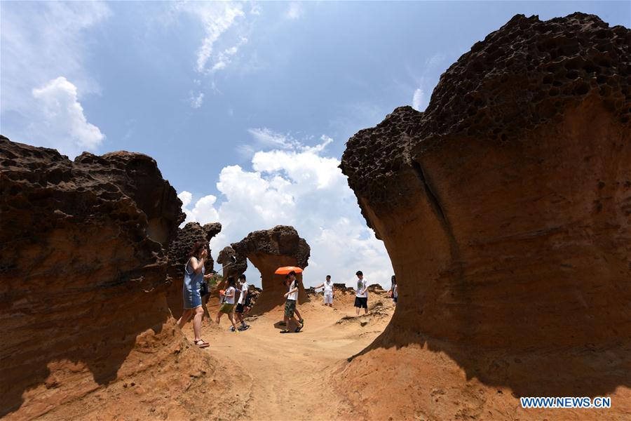 Tourists visit Yehliu Geopark in New Taipei of SE China's Taiwan