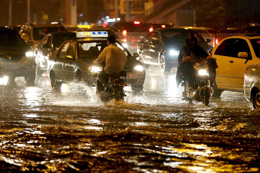 After Typhoon Nida, torrential rain hits South and Central China