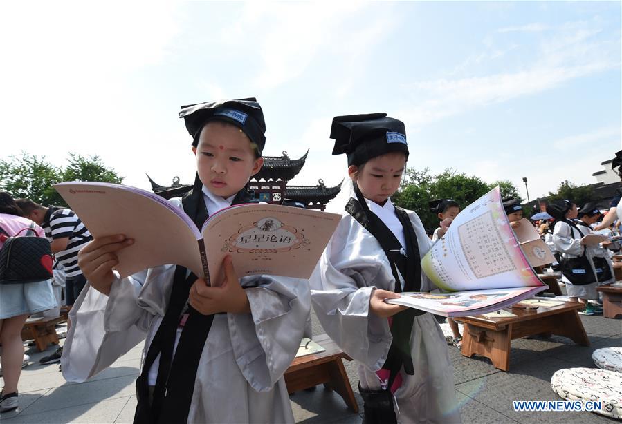 Children wearing Hanfu attend writing ceremony