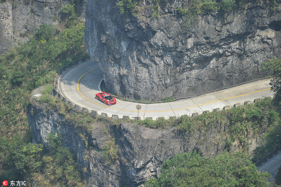 Italian sets new record with Ferrari on China's 'miracle road'