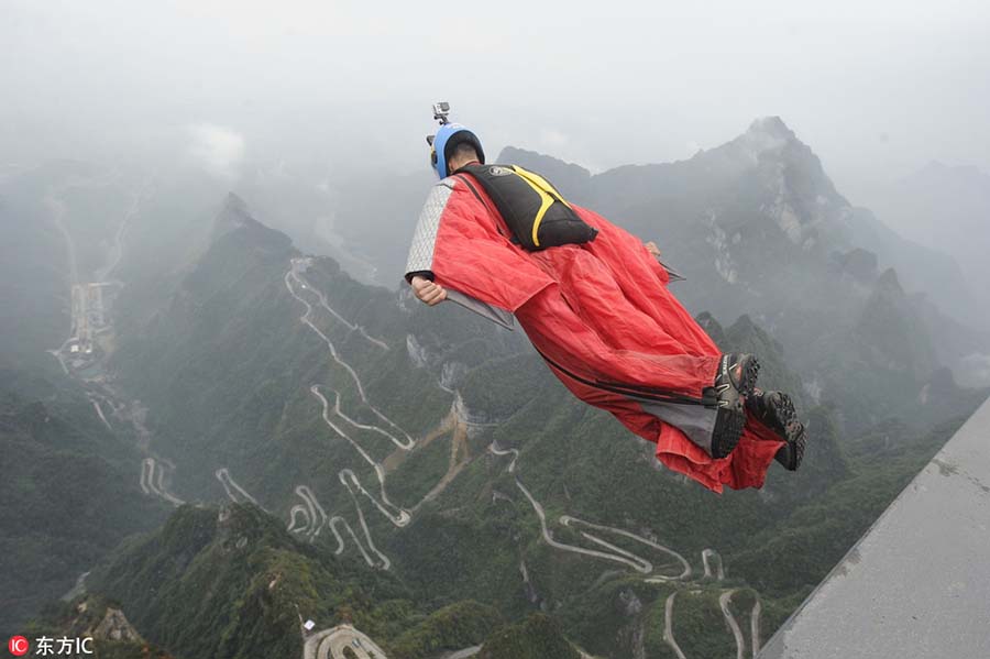 Flying over the mountains in wingsuit