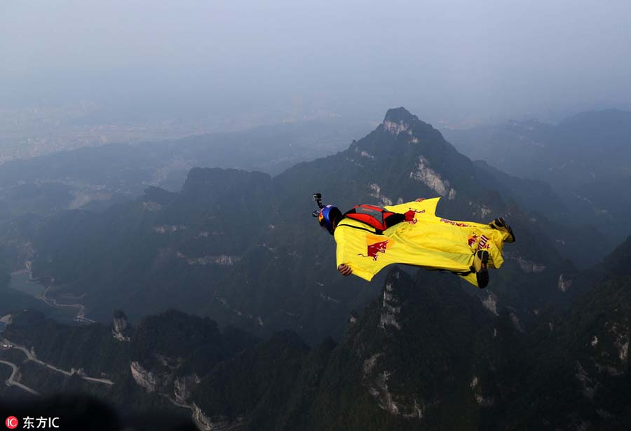 Flying over the mountains in wingsuit