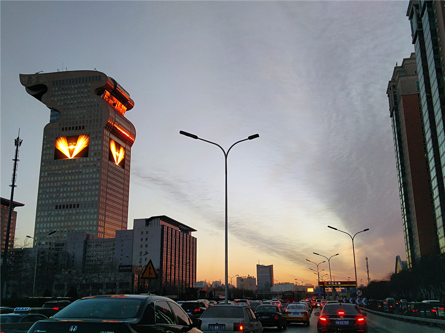 Beijing wakes to rosy dawn