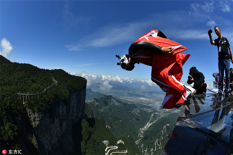 Wingsuit flying championship kicks off in Hunan