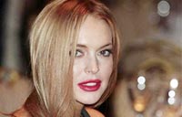 Lindsay Lohan says she's an addict, aims 'to shut up and listen'