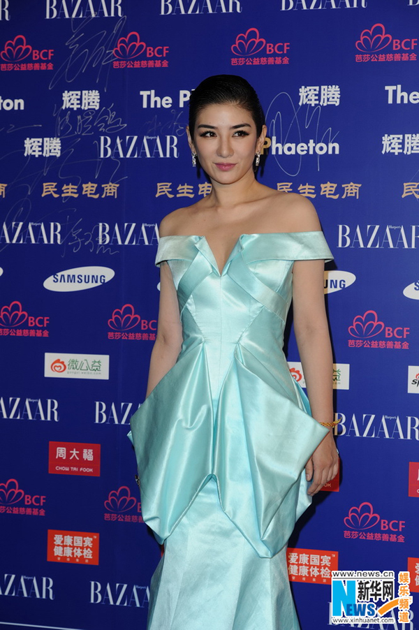 Stars attend BAZAAR's charity activity in Beijing