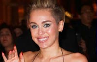 Miley Cyrus doesn't 'know how to smile'