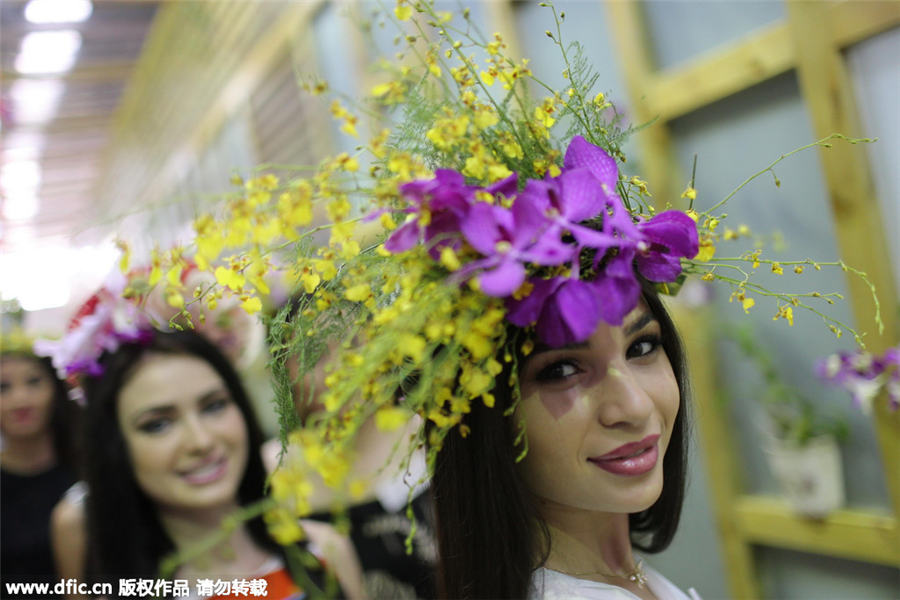 Miss World contestants at Sanya orchid show