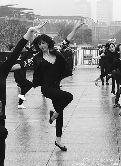 Sophie Marceau goes square dancing in Guangzhou